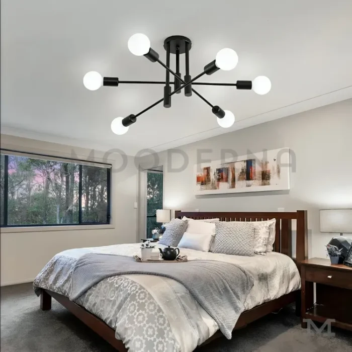 Lámpara Emma Black instalada en dormitorio moderno con tonos blancos y gris claro.