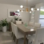 Vista lateral del comedor con la luminaria encendida.