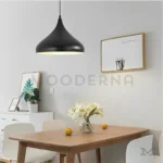 Comedor minimalista con luminaria Emily Black.