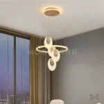 Ambiente de comedor elegante con la luminaria Dakota como protagonista.