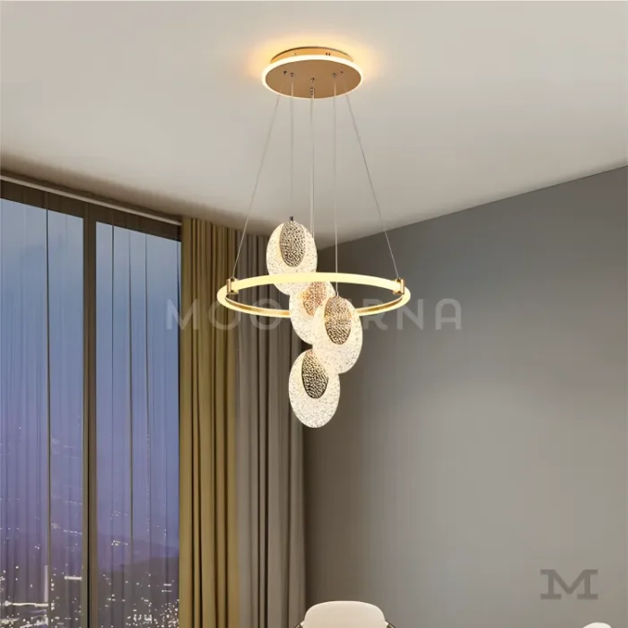 Ambiente de comedor elegante con la luminaria Dakota como protagonista.