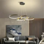 Ambiente de sala moderna con la luminaria Elisea como punto focal.