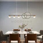 Ambiente de comedor moderno con la Luminaria Gem sobre una mesa de 6 sillas.