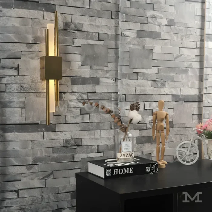 Ambiente moderno con pared clara y Luminaria Amanda Gold iluminando lateralmente.