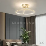 Luminaria Akira instalada en dormitorio moderno con tonos neutros.