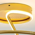 Detalle del borde interno del aro LED en tono dorado satinado.