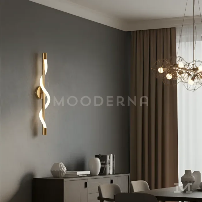 Espacio moderno iluminado con luminaria Mara Gold.