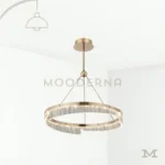 Luminaria Stellar Gold con diseño colgante moderno y elegante.