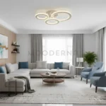 Sala decorada con detalles beige y Cyrene al centro.