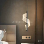 Lunisse Black sobre veladores en dormitorio oscuro