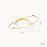 Luminaria Eclipse Gold con medidas visibles. Presenta un diámetro de 30 cm y altura de 10 cm, mostrando proporciones reales del diseño. Ideal para planificación de instalación en habitaciones o salas modernas con iluminación equilibrada.