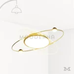 Luminaria Eclipse Gold sobre fondo blanco con diseño circular moderno y estructura dorada satinada. Fabricada en aluminio y vidrio con luz LED integrada, ofrece una iluminación decorativa elegante y contemporánea ideal para salas o dormitorios amplios.