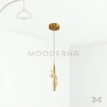 Luminaria Lunisse Gold sobre fondo blanco con diseño vertical moderno y acabado dorado satinado. Su estructura combina aluminio y acrílico con luz LED integrada, aportando un toque elegante y contemporáneo perfecto para dormitorios o rincones decorativos.