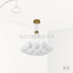 Luminaria Moon Gold en fondo blanco mostrando sus 19 esferas LED en acabado satinado, ideal para ambientes modernos y elegantes.