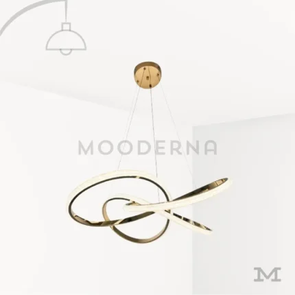 Luminaria Arisse Gold sobre fondo blanco con diseño circular en acabado dorado brillante. Elaborada en aluminio y acrílico con luz LED integrada, combina estilo moderno con una silueta fluida ideal para destacar en catálogos y páginas de producto.