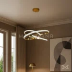 Vista lateral de la luminaria Avéne Gold encendida en sala. Se aprecian las líneas suaves del aro dorado y la intensidad equilibrada de la luz LED. Ideal para destacar la calidad del acabado y su versatilidad decorativa.