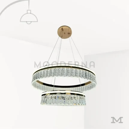 Luminaria Deline Gold sobre fondo blanco con diseño de doble aro suspendido en acabado dorado satinado. Fabricada en aluminio y acrílico con luz LED incorporada, combina estilo moderno y lujo contemporáneo ideal para destacar en catálogos de iluminación.