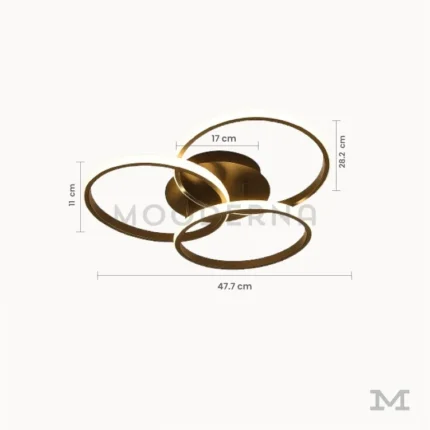 Luminaria Selene Black mostrando su diámetro real de 47.7 cm y su estructura de aluminio y acrílico con LED integrado. Su diseño de tres aros crea iluminación decorativa perfecta para ambientes entre 18 y 24 m².