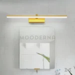 Sigrid Gold instalada en un baño amplio, aportando luz cálida ideal para rutinas diarias y armonía estética.