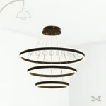 Helena Black en fondo blanco, mostrando su diseño de anillos suspendidos en acabado negro satinado con estética moderna y elegante.