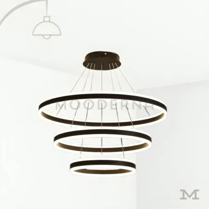 Helena Black en fondo blanco, mostrando su diseño de anillos suspendidos en acabado negro satinado con estética moderna y elegante.