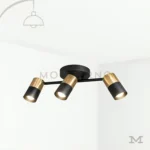 Noeimira Black and Gold en fondo blanco, destacando su diseño lineal con focos orientables en acabado negro y dorado.