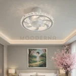 Karinna White en sala, resaltando su luz equilibrada y acabado blanco mate.