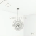 Ela Luz Plata en fondo blanco, resaltando su diseño esférico en acabado cromado con múltiples puntos de luz LED.