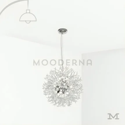 Ela Luz Plata en fondo blanco, resaltando su diseño esférico en acabado cromado con múltiples puntos de luz LED.