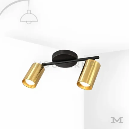 Aronia Black and Gold en fondo blanco, resaltando su diseño moderno con doble foco orientable en negro y dorado.