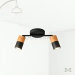 Aronia Mix en fondo blanco, resaltando su diseño moderno con doble foco orientable en acabado negro y madera.