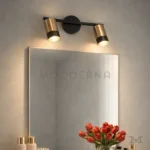 Aronia Mix instalada en baño, aportando iluminación puntual y eficiente.