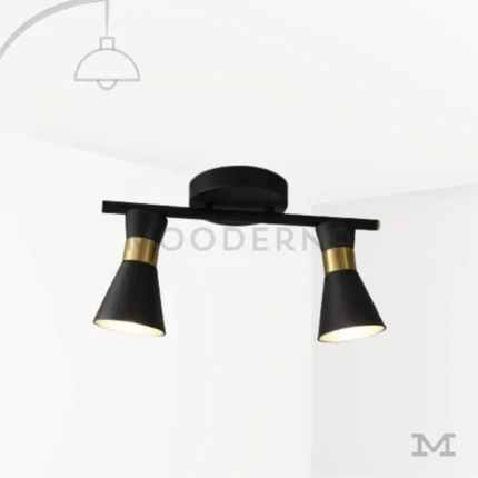 Safyra Black and Gold en fondo blanco, resaltando su diseño compacto con focos orientables en acabado negro y dorado.