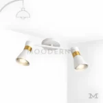 Safyra Glow White en fondo blanco, destacando su diseño minimalista en acabado blanco con detalles dorados.