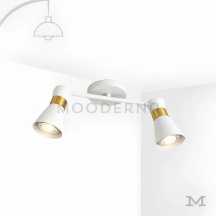 Safyra Glow White en fondo blanco, destacando su diseño minimalista en acabado blanco con detalles dorados.