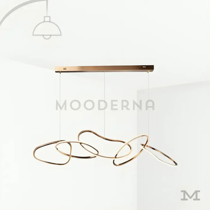 Nova Gold en fondo blanco, mostrando su diseño orgánico ondulado con acabado dorado satinado y estructura LED integrada.