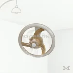 Yvonne Gold en fondo blanco, resaltando su diseño circular con acabado dorado y ventilador integrado.