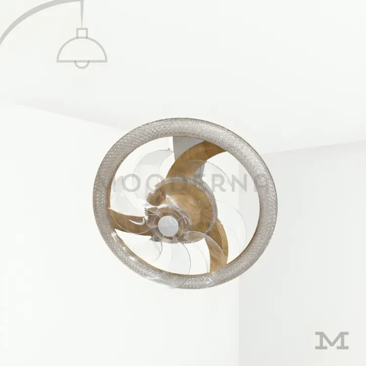 Yvonne Gold en fondo blanco, resaltando su diseño circular con acabado dorado y ventilador integrado.
