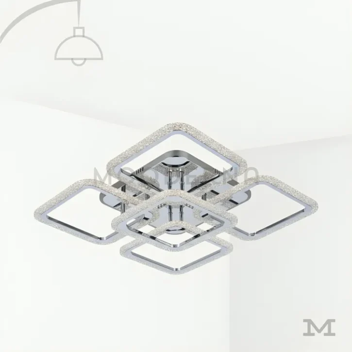 Carmina Gold en fondo blanco, resaltando su diseño geométrico moderno en acabado dorado satinado.