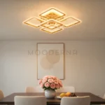 Carmina Gold en comedor, destacando la mesa central con luz uniforme.