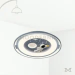 William en fondo blanco, destacando su diseño circular moderno con acabado mate y luz LED integrada.