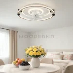 Annika en sala, destacando su integración discreta en el techo.