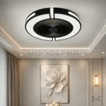 Rasmus Black instalada en sala, aportando iluminación potente y ventilación eficiente.