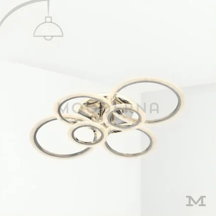 Tyra Platinum en fondo blanco, destacando su diseño moderno con aros entrelazados en acabado platino satinado.