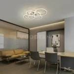 Tyra Platinum instalada en oficina, aportando iluminación potente y diseño sofisticado.