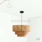 Alva en fondo blanco, destacando su diseño colgante en fibra natural con estructura liviana y estilo artesanal.