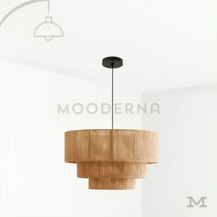 Alva en fondo blanco, destacando su diseño colgante en fibra natural con estructura liviana y estilo artesanal.