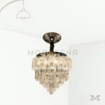 Matilda Plata Crystal en fondo blanco, destacando su diseño elegante con cristales decorativos y acabado plateado brillante.