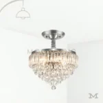 Pauline Plata Crystal en fondo blanco, destacando su diseño elegante con cristales decorativos y acabado plateado brillante.