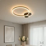 Trueno Black instalada en comedor, iluminando la mesa principal con estilo moderno.